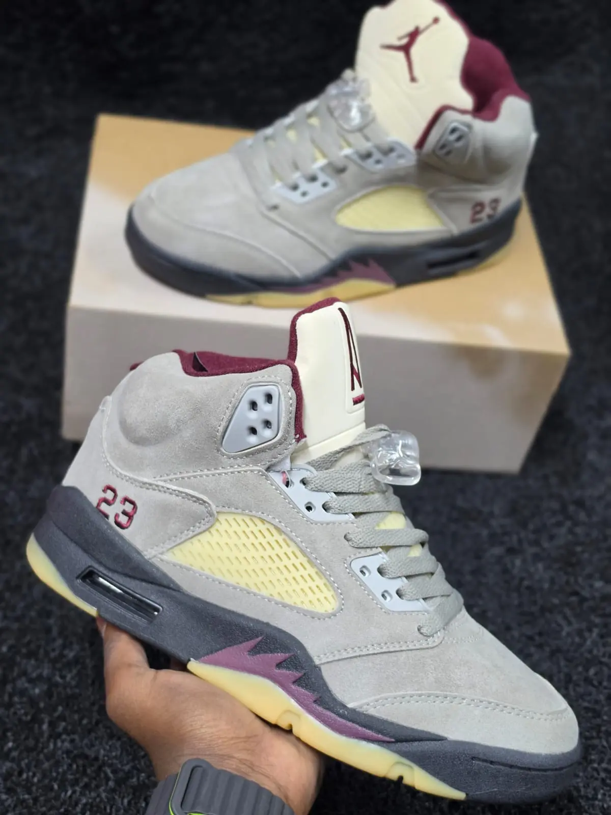 The A Ma Maniére x Air Jordan 5 Retro 'Dawn' features a light bone suede upper original - Detail View Kenya